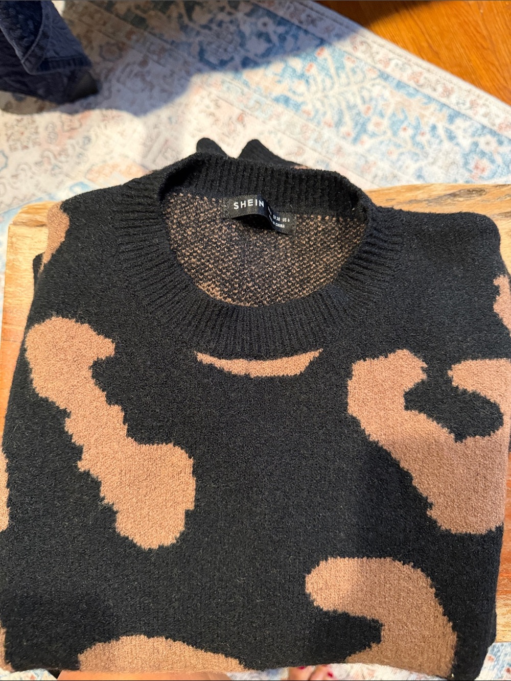 SHEIN Black Crewneck Sweater with Brown Abstract Patches